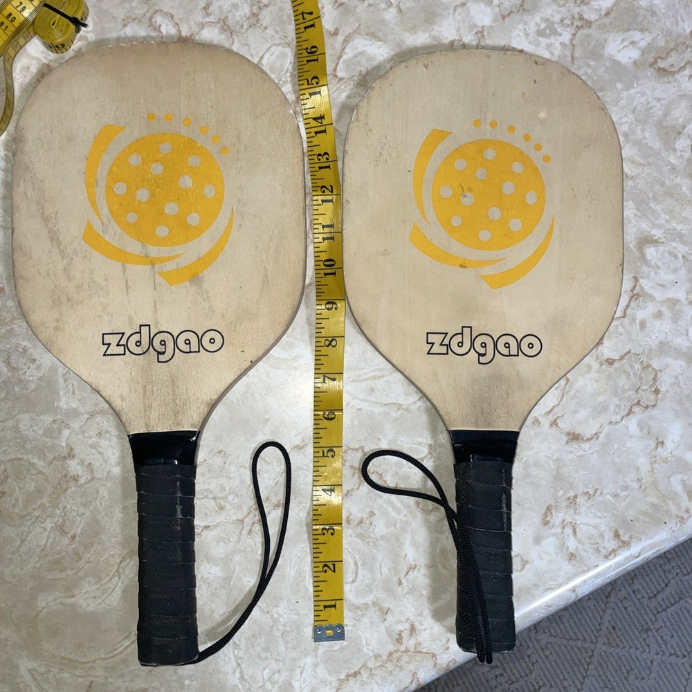 pair of wooden pickleball zdgao paddles with safety straps wrapped handles